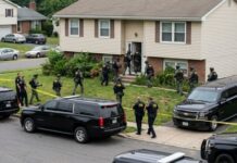 FBI Dawn Raid BACKFIRES — Father Wins MILLIONS… Law enforcement officers conducting a raid in a residential neighborhood