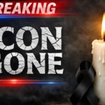 R.I.P. Radio Icon DIES After Mystery Hospitalization… A lit candle beside a black ribbon with the text 'BREAKING ICON GONE'