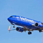 UPS Jet HORROR: Engine Explosion VIDEO Unleashed Jet aircraft in flight against clear blue sky.
