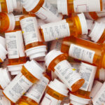 Supreme Court BLOCKS Pill Ban—Legal Chaos LOOMS A pile of prescription medication bottles with labels