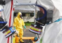 Ebola ‘Perfect Storm’ Looms – CDC’s Dire WARNING… Emergency responders in hazmat suits preparing for a situation