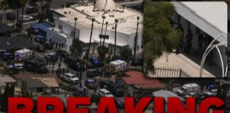 Aerial view of a large police presence at a scene marked as breaking news