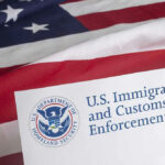 U.S. Immigration and Customs Enforcement document on American flag.