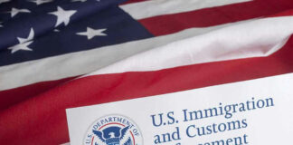 U.S. Immigration and Customs Enforcement document on American flag.
