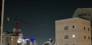 Iranian missiles streak across sky over Israel