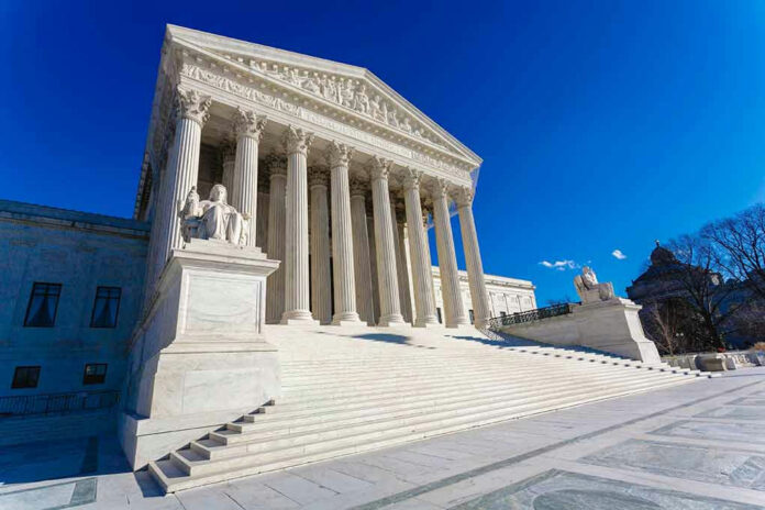 376063027-1 Supreme Court building with columns and statues.