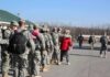 Hotels Marked: Iran Redraws The Map Soldiers in uniform line up outdoors with gear