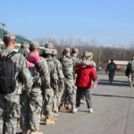 Hotels Marked: Iran Redraws The Map Soldiers in uniform line up outdoors with gear