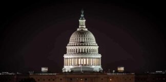 United States Capitol dome illuminated at night