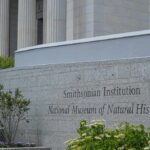 Why America’s Museums Are Under Fire Smithsonian Institution museum exterior with engraved stone sign