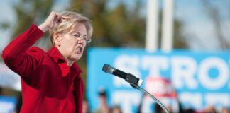Elizabeth Warren passionately speaking at a political rally