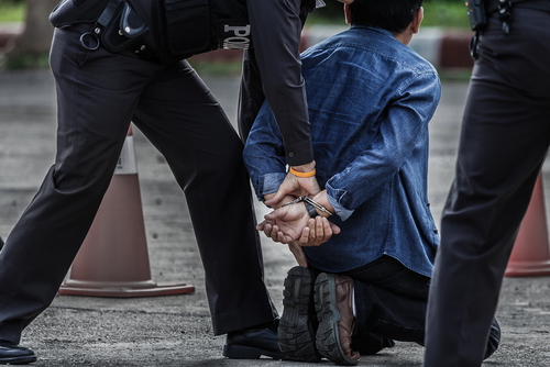 Police,Steel,Handcuffs,police,Arrested,professional,Police,Officer,Has,To,Be,Very Police officers arresting a suspect in handcuffs