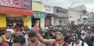 Migrant caravan sets out from southern Mexico amid asylum delays and unemployment