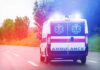 A Hidden Battery Danger Claims A Young Life Ambulance van with flashing lights on a rural road