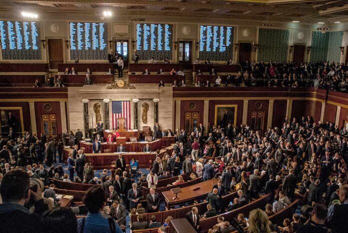 shutterstock_1186368289 House chamber filled with lawmakers and staff