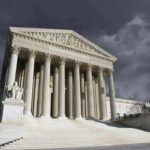 Aid YANKED For Ministry Majors — Court Steps In United States Supreme Court building with columns under stormy sky