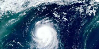 Satellite view of a powerful hurricane swirling over the ocean