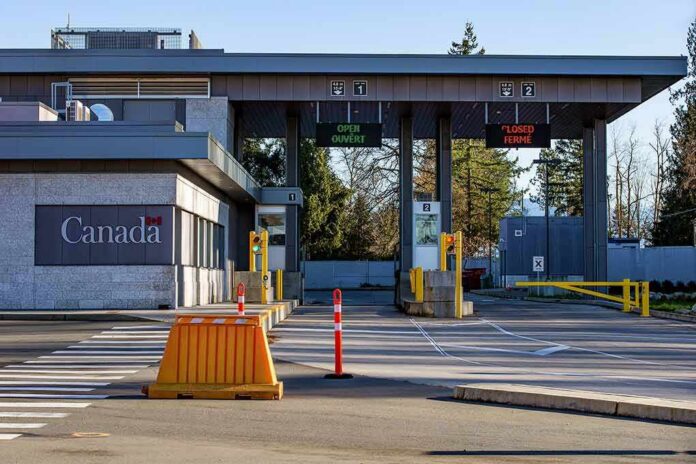 Canada border crossing booths with open and closed lane signs