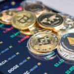 Trump Pardon Shocks Crypto — What’s The Catch? Stack of cryptocurrency coins on a trading app screen