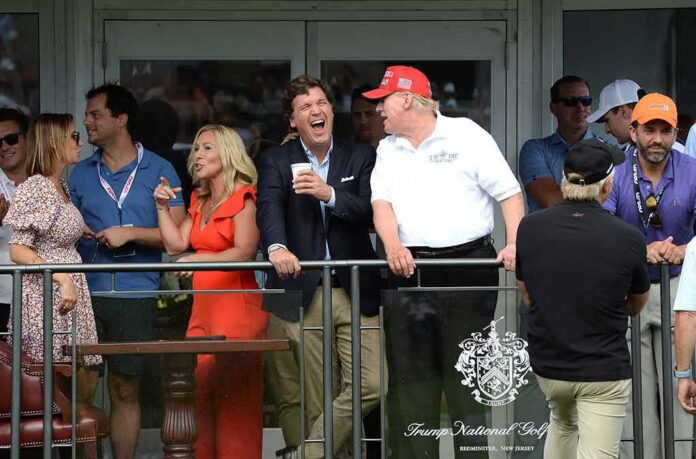 shutterstock_2185700449 Group of spectators on a balcony at a golf event