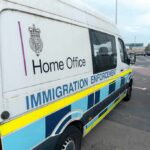 Tough Visa Rule Hits Close To Home Immigration enforcement van parked on a street