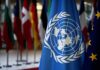 Rights Chief Warns: AI Overreach United Nations flag among international flags