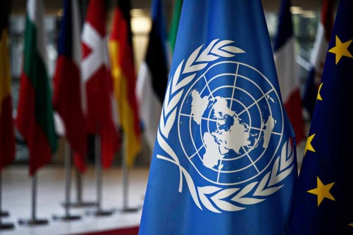 shutterstock_1091235857 United Nations flag among international flags