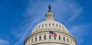 United States Capitol dome with American flag