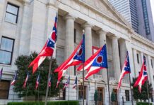 Prediction Flip Rocks Ohio Governor Race Ohio flags outside a neoclassical government building