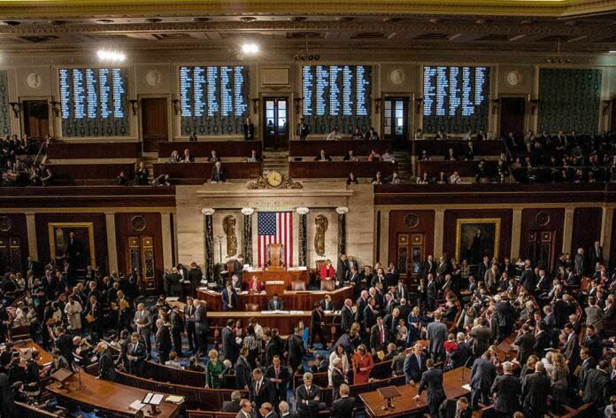 U.S. House chamber with lawmakers gathered on the floor