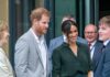Prince Harry, Duke of Sussex, and Meghan, Duchess of Sussex speaking with attendees