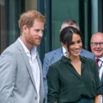King Slams Brakes On Sussex Comeback Prince Harry, Duke of Sussex, and Meghan, Duchess of Sussex speaking with attendees