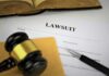 Hypocrisy Charge Hits ‘Tax The Rich’ Star Lawsuit documents with gavel, pen, and legal book