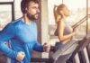 Man in blue long-sleeve running on a treadmill with headphones