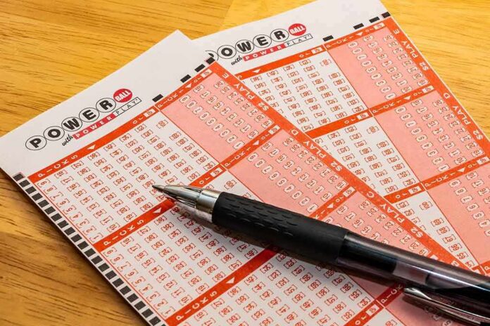 shutterstock_1263329296 Powerball lottery play slips with a black pen