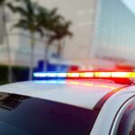 Police car roof with flashing red and blue lights
