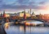 Peace Track Stalled – Leverage War Begins Kremlin complex by a river at sunset