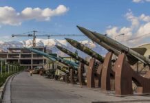 Row of missiles on display outdoors