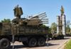 Deterrence Or Drift – Who’s In Charge? military air defense vehicles on a road