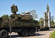 Deterrence Or Drift – Who’s In Charge? military air defense vehicles on a road
