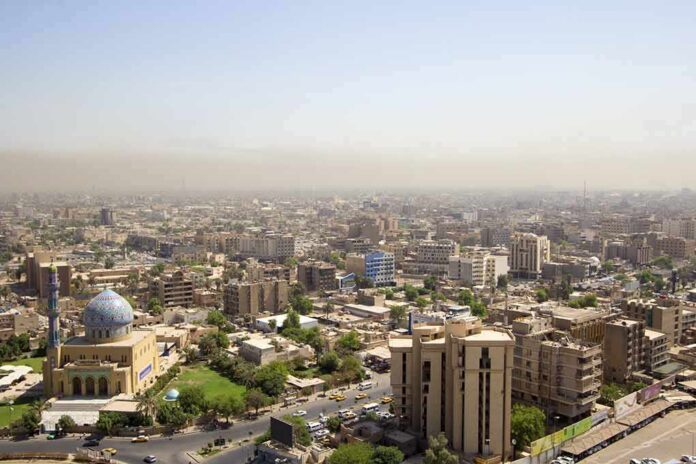 City skyline with mosque and dome in foreground