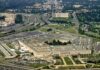 Did Hegseth Overstep War Limits? Aerial view of a large five-sided government building with surrounding highways