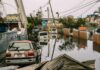 Jersey Shore DROWNS – State Emergency Flooded urban street with abandoned cars and downed power lines