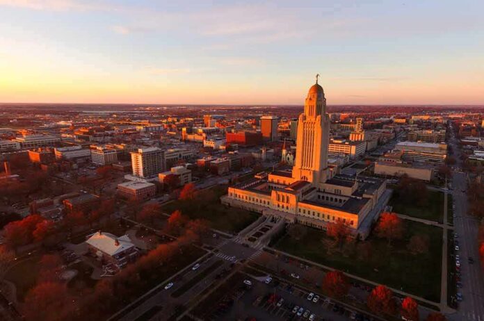 shutterstock_1025673625 State capitol building at sunset overlooking a city