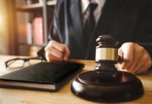 Federal Overreach? States Push Back Hard Judge with gavel striking sound block