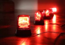 Red emergency beacons on a floor