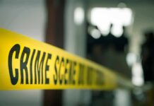 The Judge Ruled. Hours Later, She Was Gone crime scene tape in a blurred indoor setting