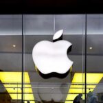 Apple logo on glass storefront