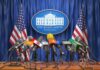 Trump Targets Media – Billion-Dollar Blitz Press microphones at a White House briefing podium