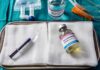 Governor Slams Brakes After Grisly Ordeal Medical tray with syringe and pentobarbital vials on gauze